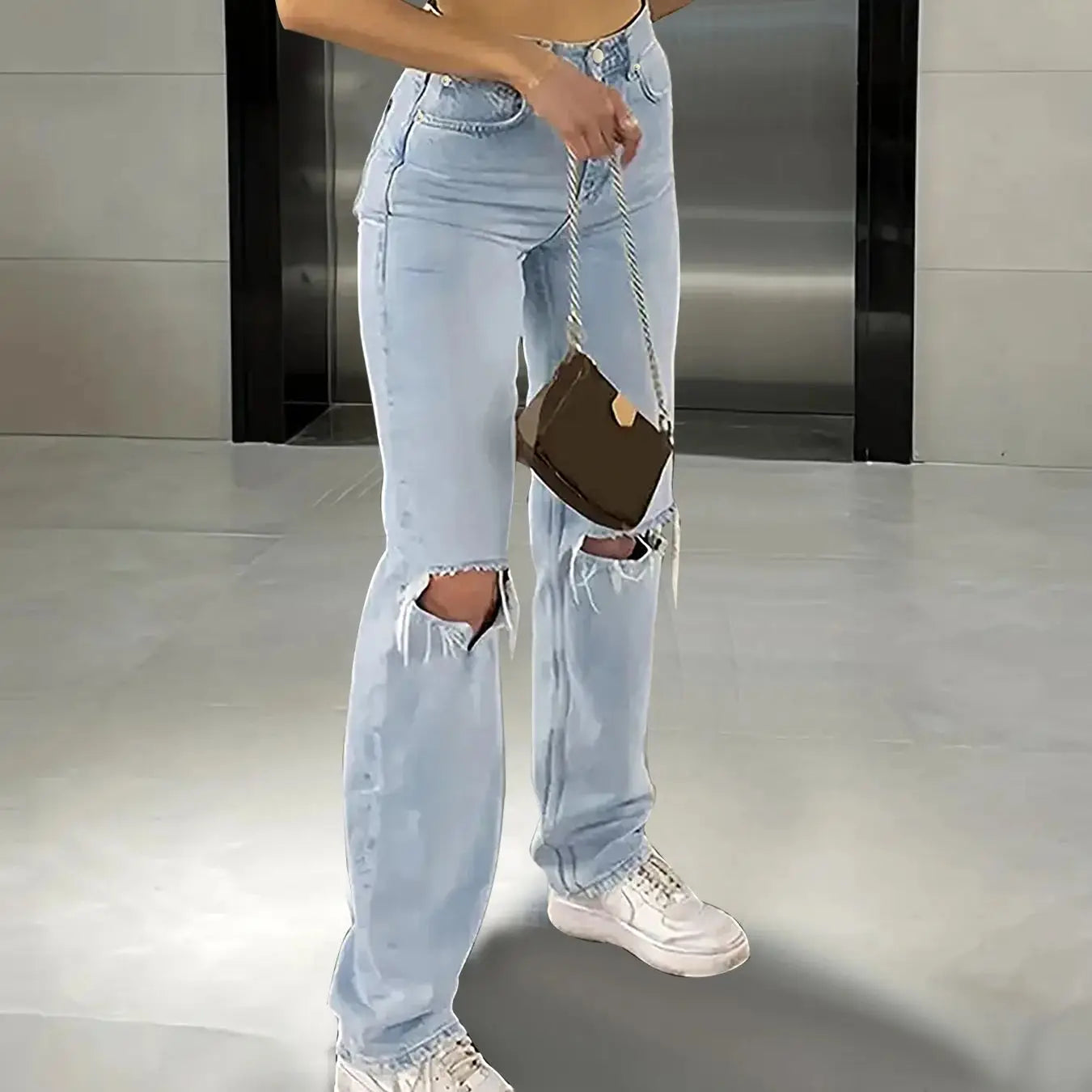 Knee-Piercing Jeans